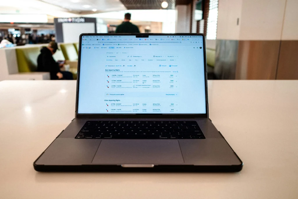 light booking website showing where to buy cheap flights to New York with multiple airline options and prices
